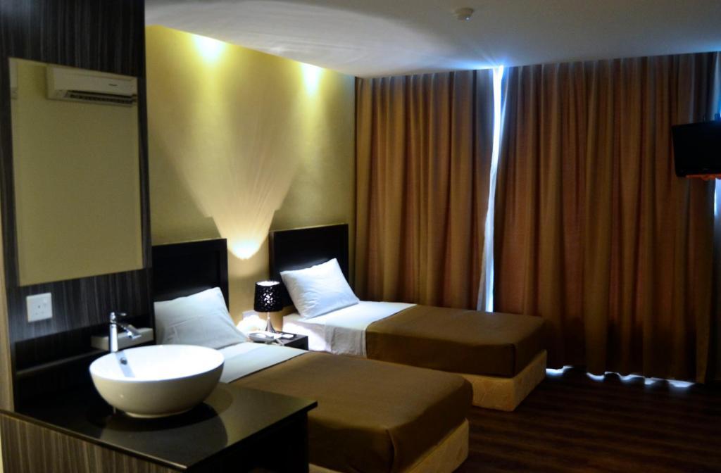 Zotel Business & Leisure Hotel Kuching Quarto foto