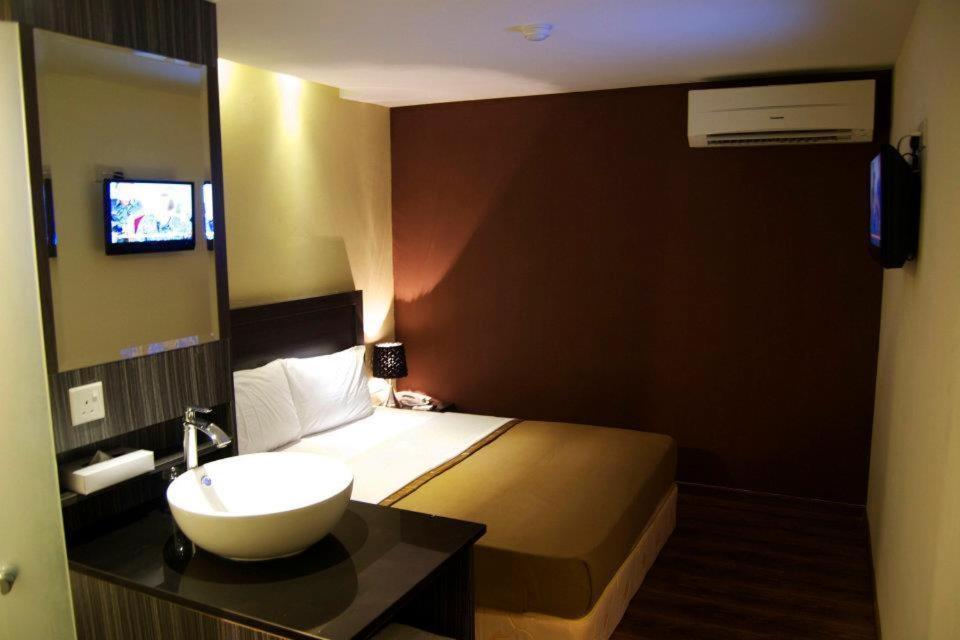 Zotel Business & Leisure Hotel Kuching Quarto foto